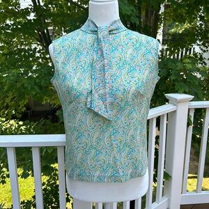 Vintage 1960s-70s sleeveless paisley top with removable jabot; no tags